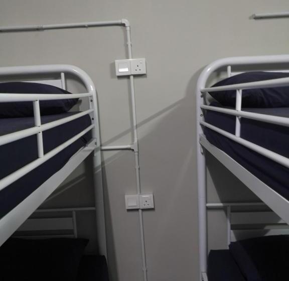 מיטה בחדר משותף, Spot On 90449 Bed Station Guest House Dormitory