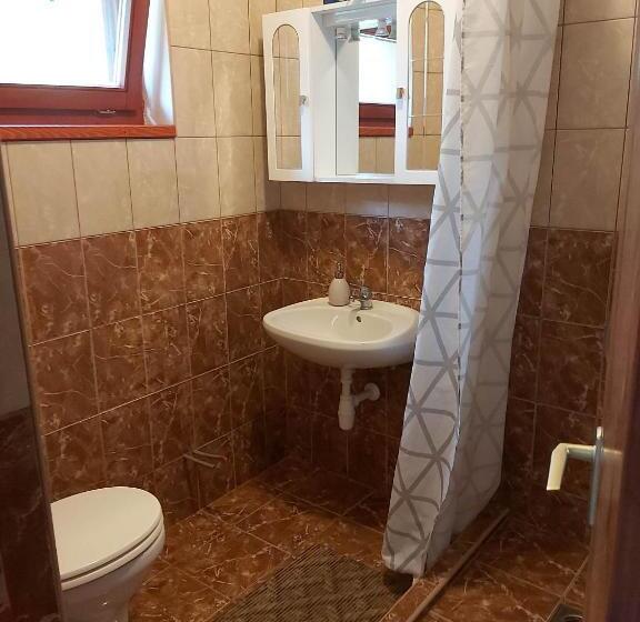 低层单卧公寓, Számadó Vendégház