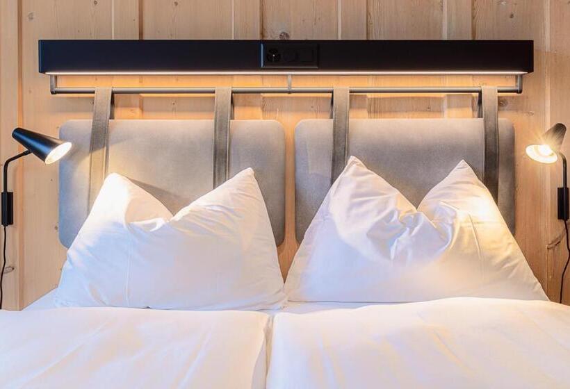 스위트, Alpine Inn Davos