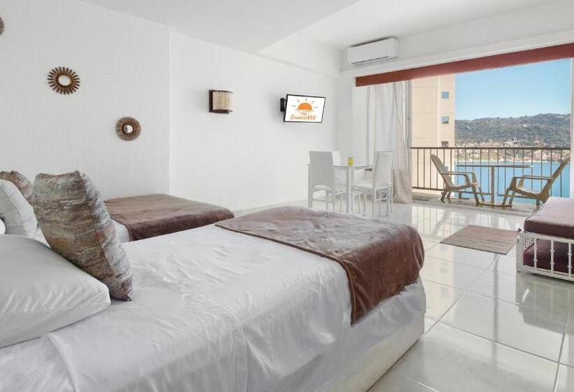 اتاق استاندارد چهار تخته با چشم‌انداز دریا, Suites Torres Gemelas Vip