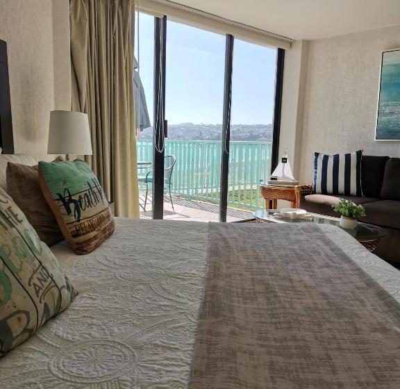 סטודיו דלוקס, Condominios San Carlos