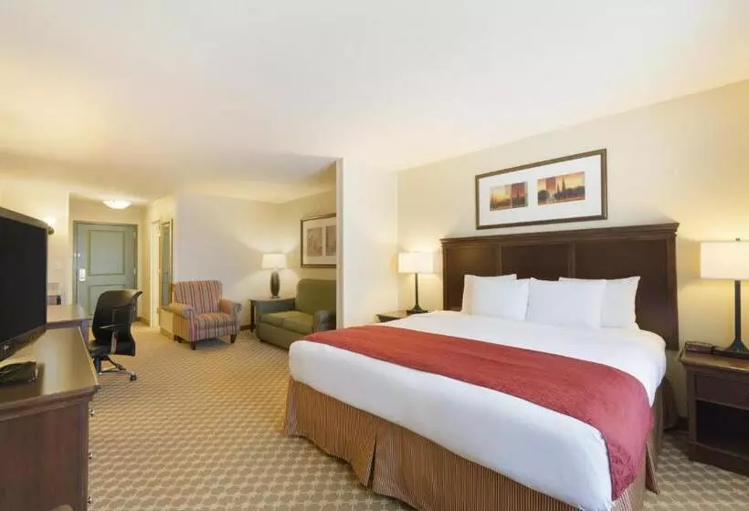 キングサイドベッドのスタンダードワンルーム, Country Inn & Suites By Radisson, Covington, La