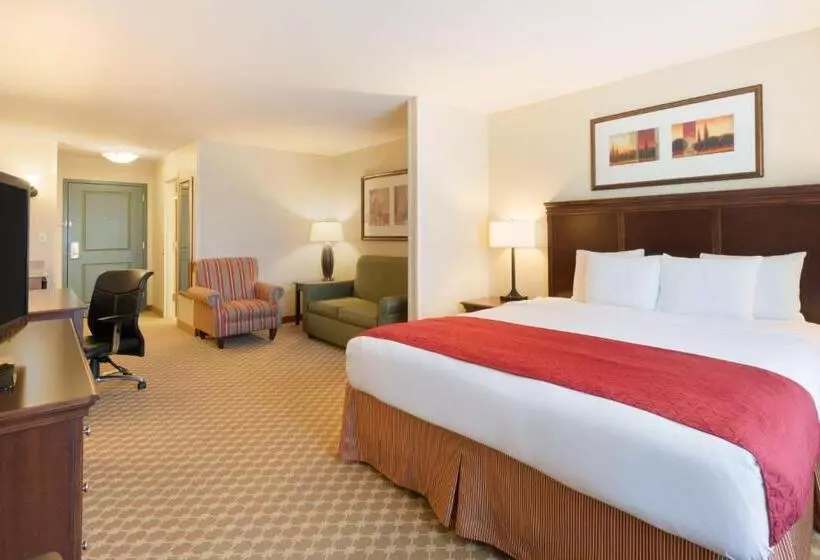 キングサイドベッドのスタンダードワンルーム, Country Inn & Suites By Radisson, Covington, La