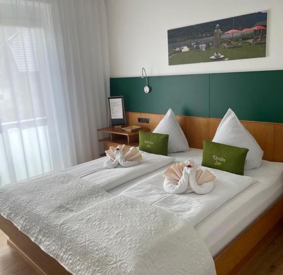 اتاق استاندارد با بالکن, Seehaus Kärnten Inn Mit Direktem Seezugang Und E Ladestation