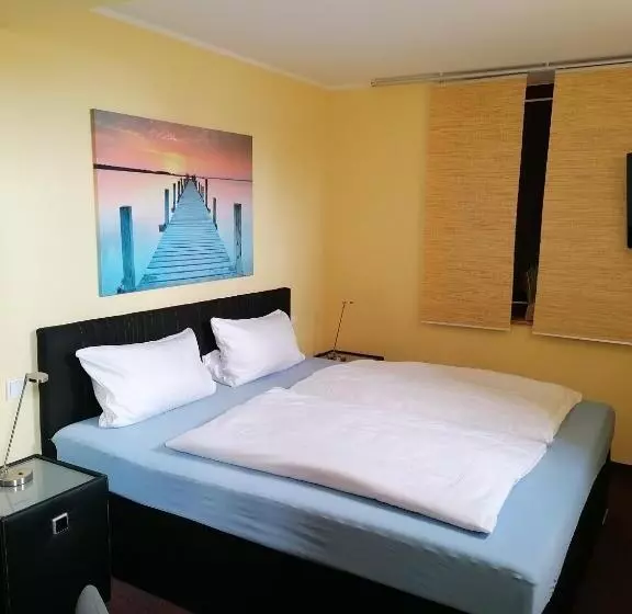 キングサイズベッドのスタンダードルーム, Pension Riverside In Leverkusen Hitdorf Am Rhein Zentral An Der A1 Und 59
