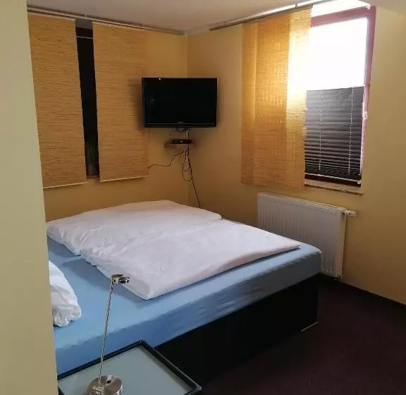 キングサイズベッドのスタンダードルーム, Pension Riverside In Leverkusen Hitdorf Am Rhein Zentral An Der A1 Und 59