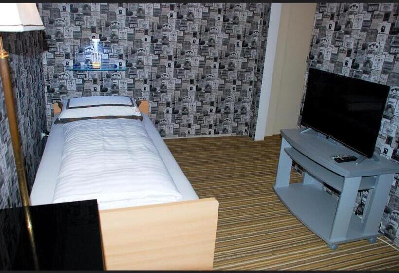 标准单人间, Rössle