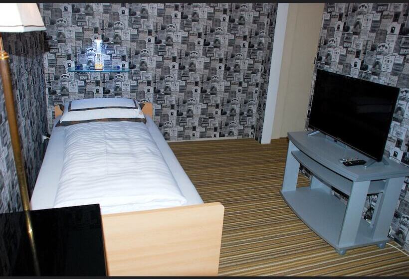 标准单人间, Rössle