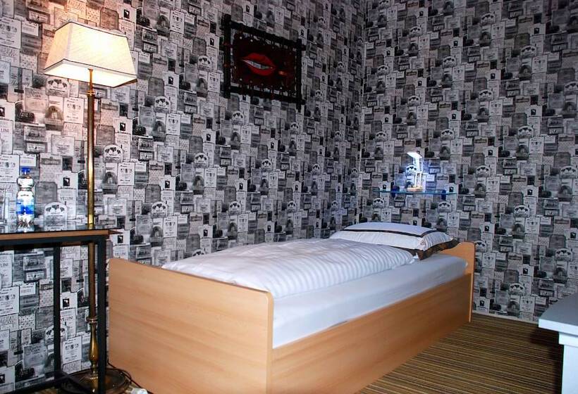 标准单人间, Rössle