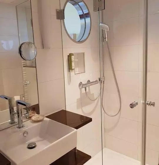 バルコニーつきオーシャンビュースーペリアルーム, Strandhotel Vierjahreszeiten