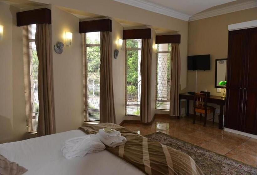 Quarto Deluxe, Cornerstone Guest Lodge