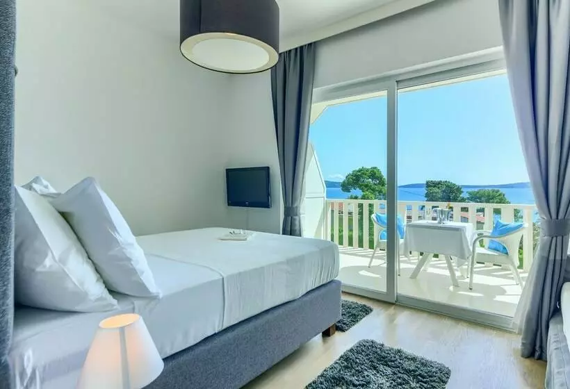 Quarto deluxe vista mar, Riva
