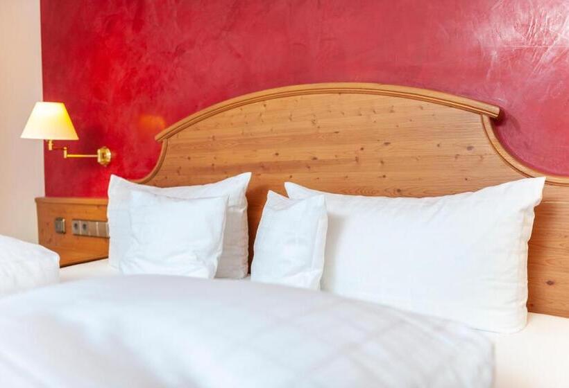 高级小型套房, Rössle