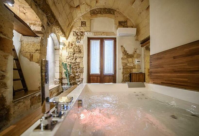 キングサイズベッドのスイートルーム, Sacratum B&b Suite Spa