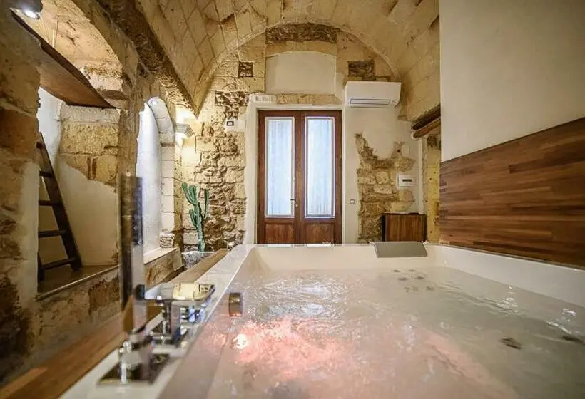 キングサイズベッドのスイートルーム, Sacratum B&b Suite Spa