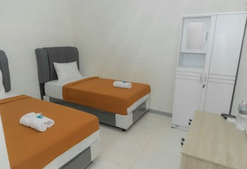 デラックスルーム, Capital O 94156 Hotel Gemudi Gold Islami