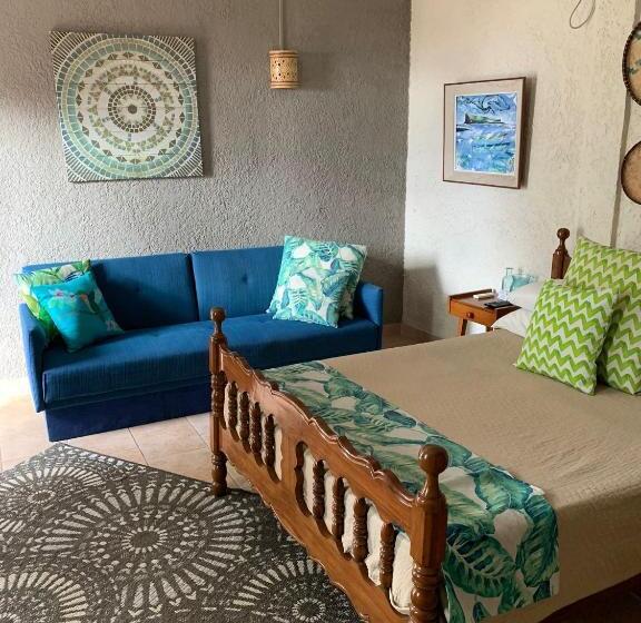 اتاق استاندارد سه تخته با چشم‌انداز باغ, Chillpill Guest House