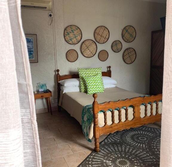 Chambre Triple Standard Vue Jardin, Chillpill Guest House