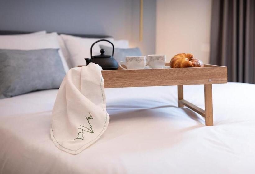 חדר קומפורט לשלושה, Camere D Aria