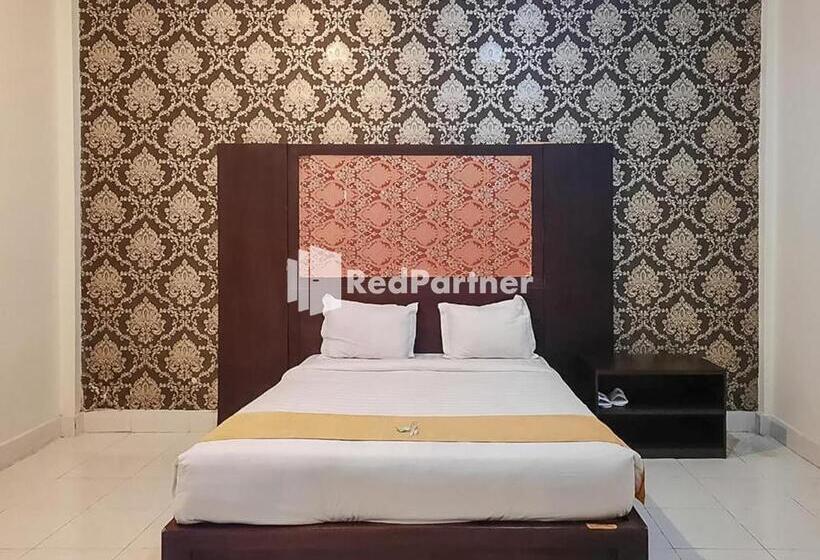 חדר דלוקס, Puri Yasmin Potowanua Lasusua Mitra Reddoorz