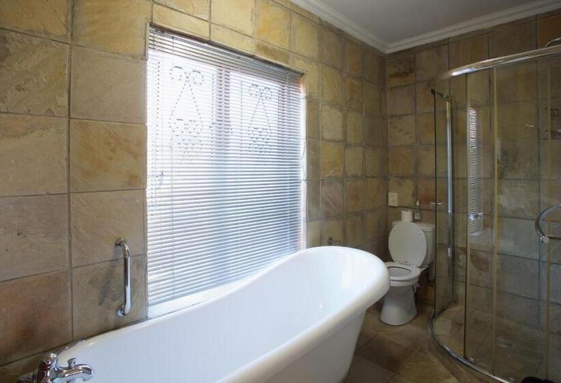 חדר דחוקס עם מיטת קינג, Sea Whisper Guest House