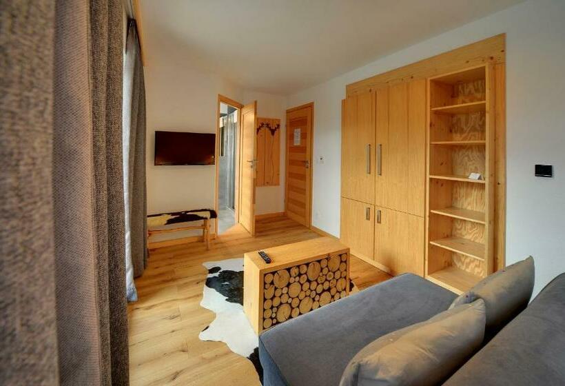 豪华三人间, Dom Górski