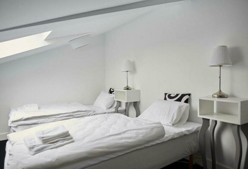 חדר אקונומי לארבעה, Biała Wstążka B&b