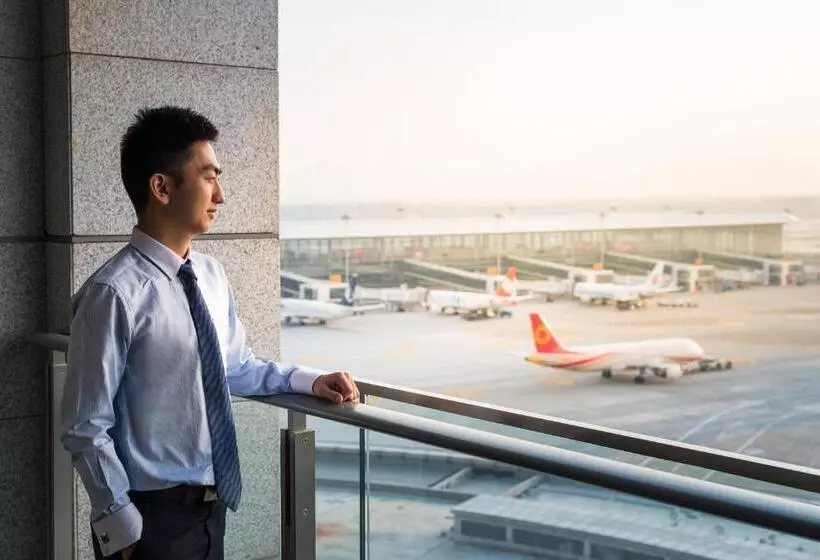 キングサイズベッドのデラックスルーム, Pullman Nanjing Lukou Airport