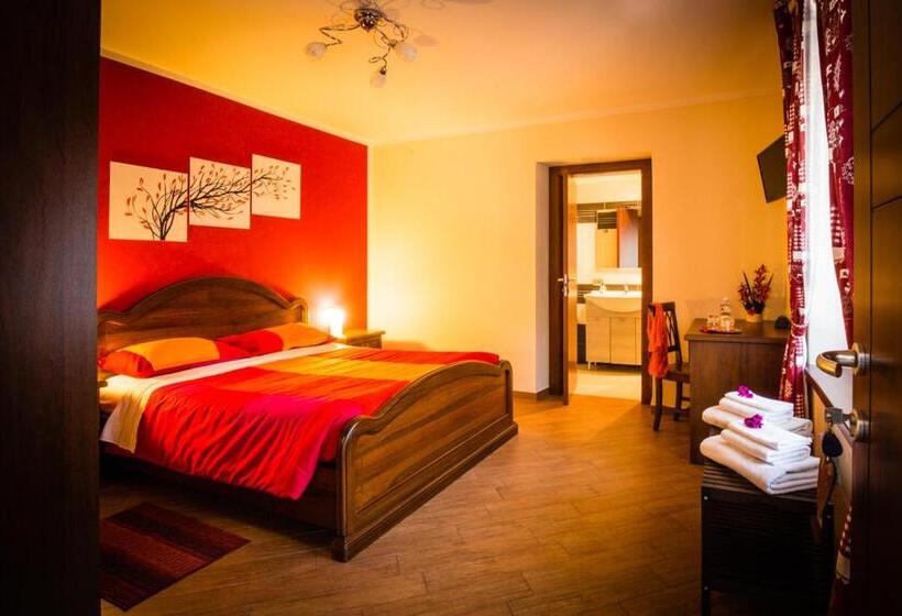 חדר דלוקס, Mandoué