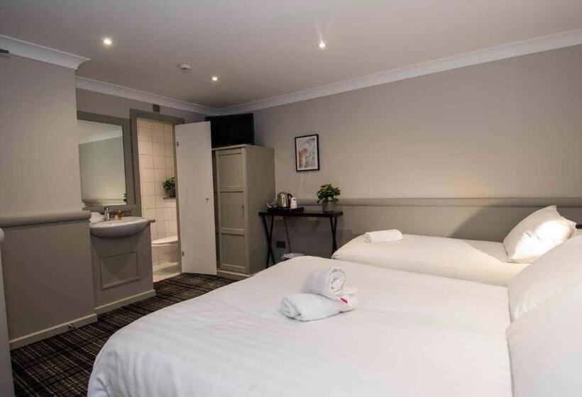 غرفة قياسية رباعية, Howard Winchester