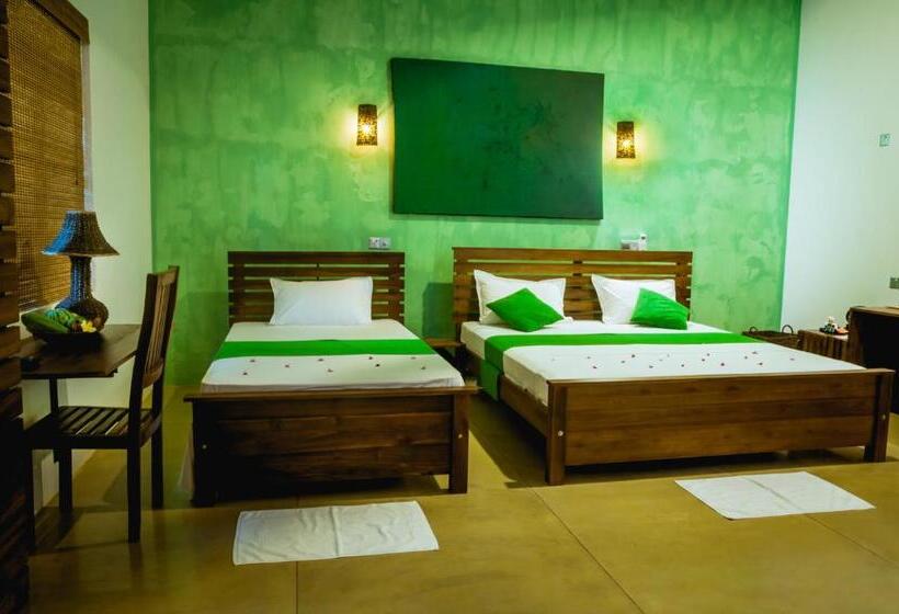 חדר דלוקס לשלושה, Garcinia Leaf