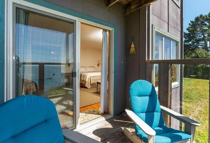 キングサイズベッドのスイートルーム, Turtle Rocks Oceanfront Inn