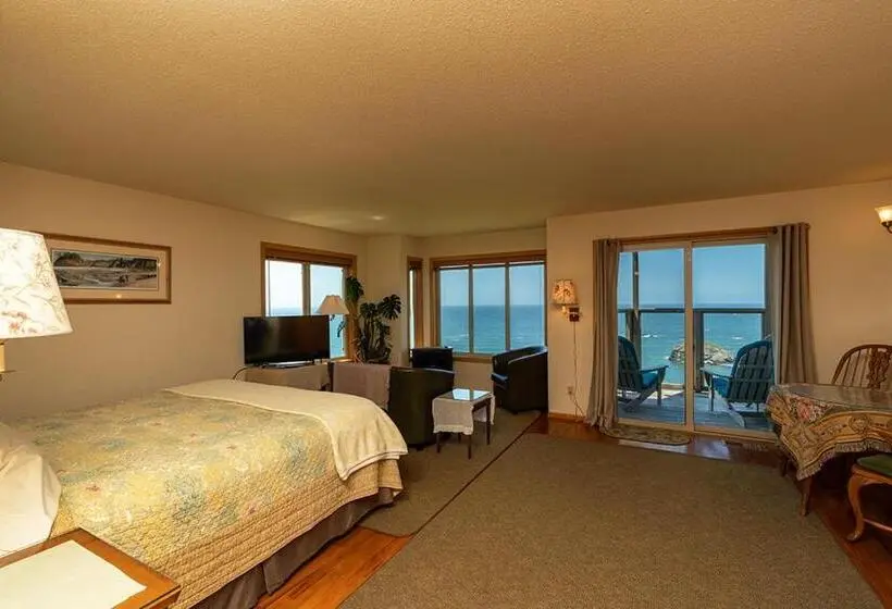 キングサイズベッドのスイートルーム, Turtle Rocks Oceanfront Inn