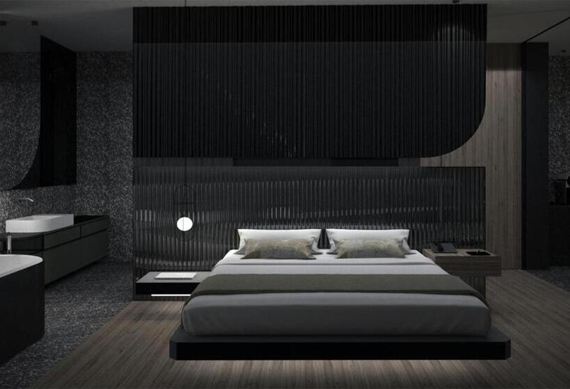 Suite with lake view, Al Caminetto Worldhotels Crafted Adults Only