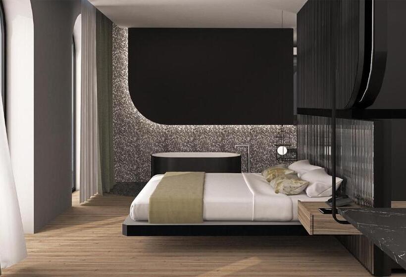 Suite with lake view, Al Caminetto Worldhotels Crafted Adults Only