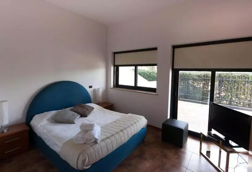 Huoneisto 1 Makuuhuone Puutarhanäkymä, Della Piana Residence