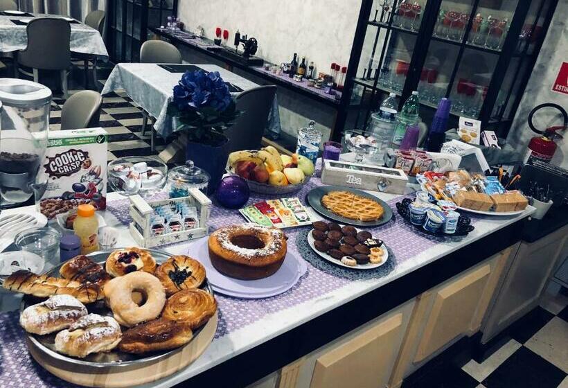 חדר סטנדרט לשלושה, Maximo