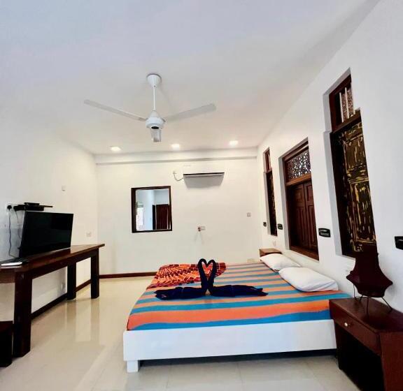 Habitació Deluxe, Gomez Place