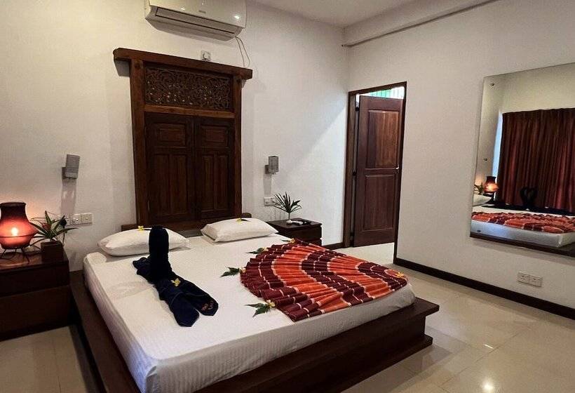 Habitació Deluxe, Gomez Place