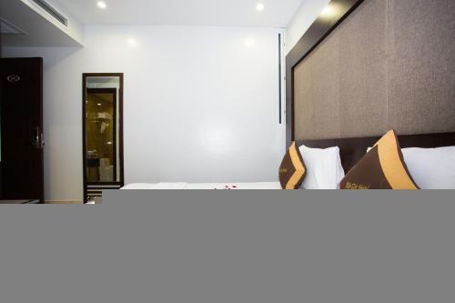 اتاق استاندارد چهار تخته با چشم‌انداز دریا, Moc Tra Hotel Tuan Chau Hạ Long