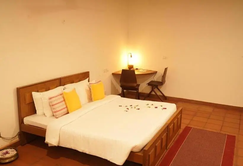 キングサイズベッドのスタンダードルーム, Niraamaya Retreats Vaidekam, Kannur