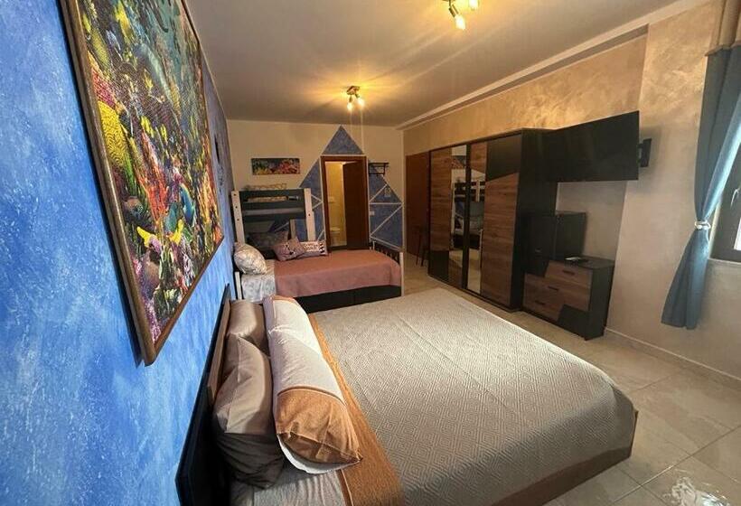 غرفة عائلية, Triangolo Delle Bermuda B&b