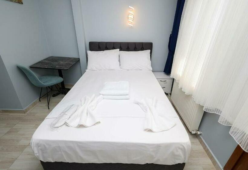 Quarto Familiar, Merdin Suites & Hotel   Downtown