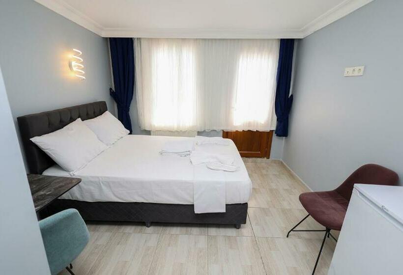 Quarto Familiar, Merdin Suites & Hotel   Downtown