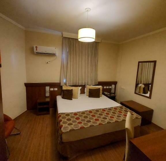 Quarto deluxe, Class Hotel Passos