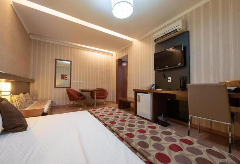 Quarto deluxe, Class Hotel Passos