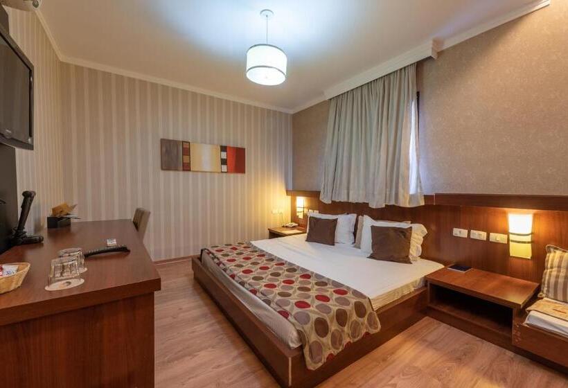 Quarto deluxe, Class Hotel Passos