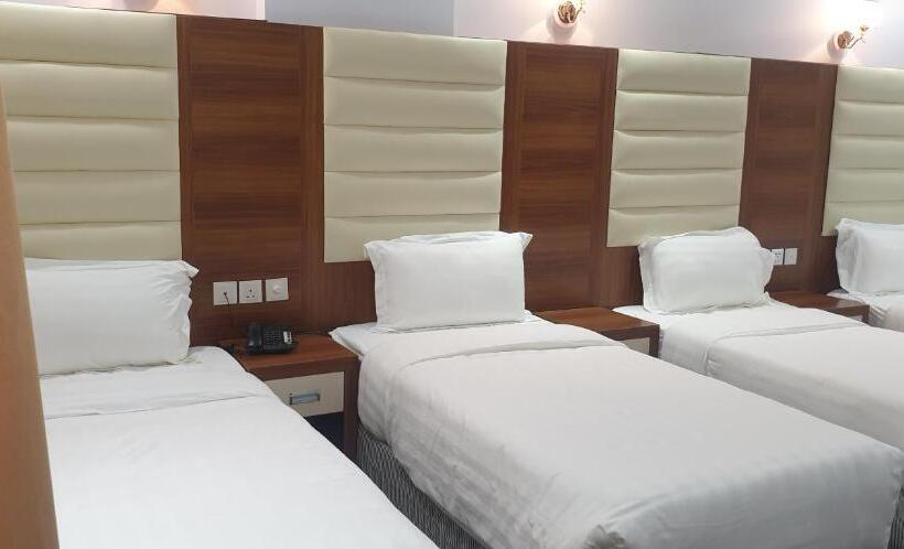 غرفة قياسية رباعية, فندق اجيال المدينة 1