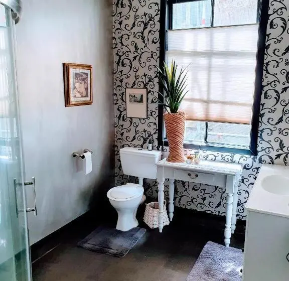 Huoneisto 1 Makuuhuone Puutarhanäkymä, La Riviera Guesthouse