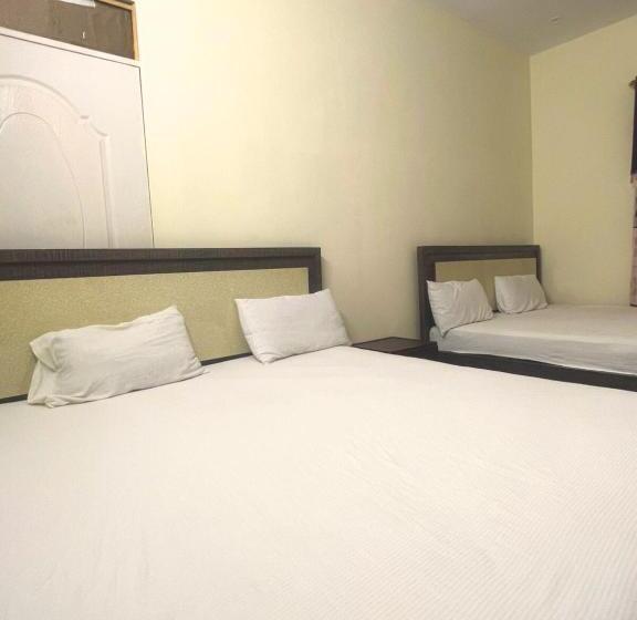 Economy Triple Room, The Value Guest House Near Airport